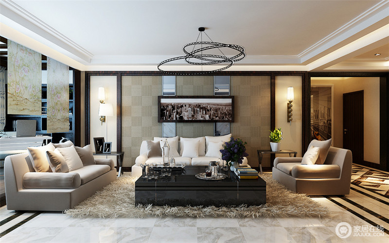 软质的白色沙发，硬朗的黑色茶几，绒质地毯，大都会风格的装饰画，让客厅呈现出都市时尚感。极具动感的立体几何灯具，则画龙点睛的描绘出一抹跃动的画面。