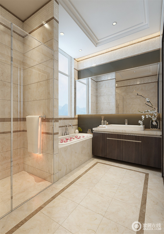 卫浴间通过墙体结构将浴缸区与淋浴区自然区分，淋浴区的玻璃门让空间更显通透利落；米色地砖与褐色盥洗柜中性色调营造的层次感，让整个空间硬朗大气。