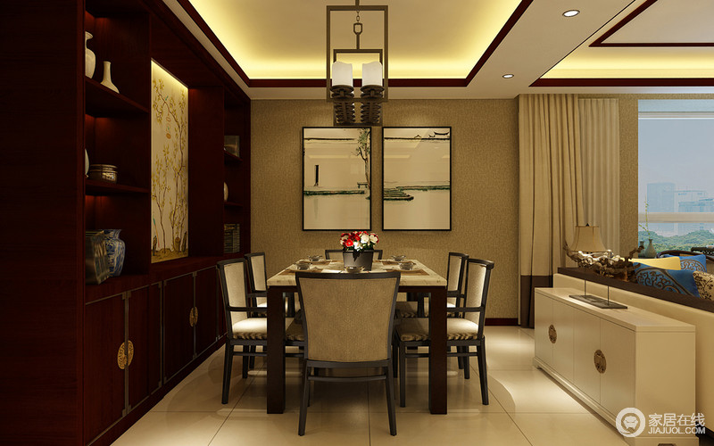 餐厅简洁实用，新中式餐桌及餐椅让空间丝毫不老气，反而更显新式质感。对称相伴的两幅写意中国画意蕴深刻，让人忍不住想停留在此。