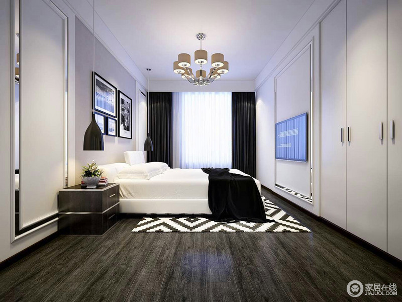 黑灰色地板冷灰不减，黑白菱形地毯照映着白色的床品多了些白净和摩登；黑色吊灯和边柜与白色墙面形成黑白双生曲，写照着冷酷地家居时尚。