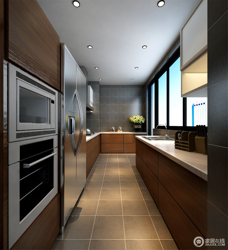 厨房灰色方砖配黄棕实木，沉稳拙朴。狭长型的格局本身活动区域就比较受限，设计师将家电巧妙的利用与壁橱同色系的柜体融合到墙体之中，释放出水平空间，也方便主人烹饪时的拿取。