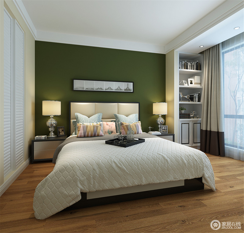 墨绿色的背景墙与木地板的温实构成自然之趣，绿意中化作清新；几何床背与简约床头柜形成现代之美，而粉色、蓝色的靠垫轻柔而舒曼，给予空间轻缓的温柔；简约立式书柜收纳了杂物，更显整洁。