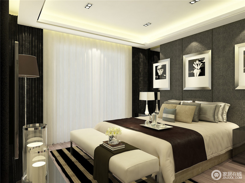卧室整体以舒缓的深浅色搭配，营造出舒缓融合的休憩氛围。床头背景墙上饰以黑白银框挂画，既展现出主人的品味格调，又使空间充满了时尚质感。