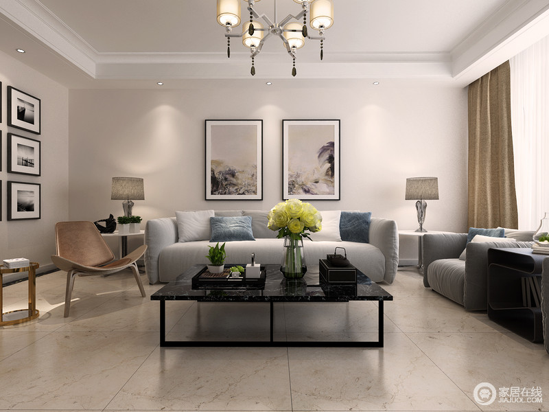 从简单地布置中可以看到设计的密码，利用灰色沙发、台灯和大理石茶几等来填充空白的空间，让家变得饱满。