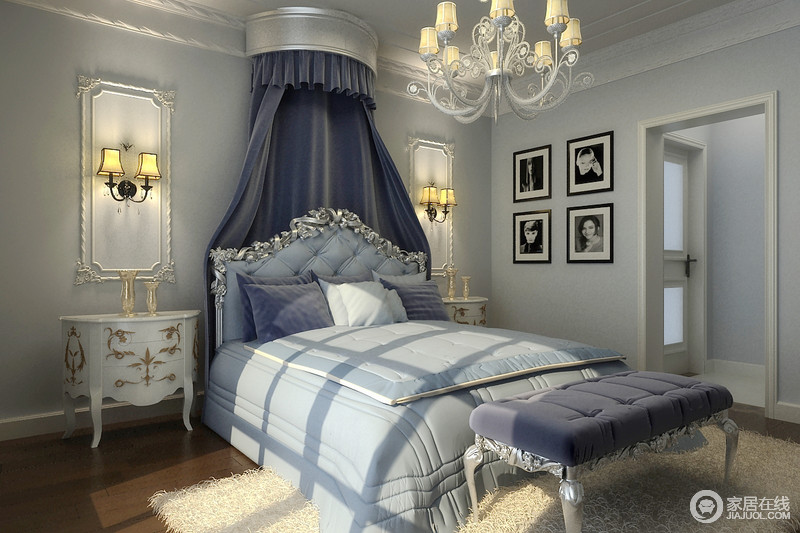 浅淡的墙面蓝，与纯真的天蓝床品及深蓝的床帏和尾凳，形成空间色调上的深深浅浅。壁灯被装饰在雕花线条勾勒的装饰框里，与白色精雕华奢的床头柜形成空间里的奢华浪漫情调。