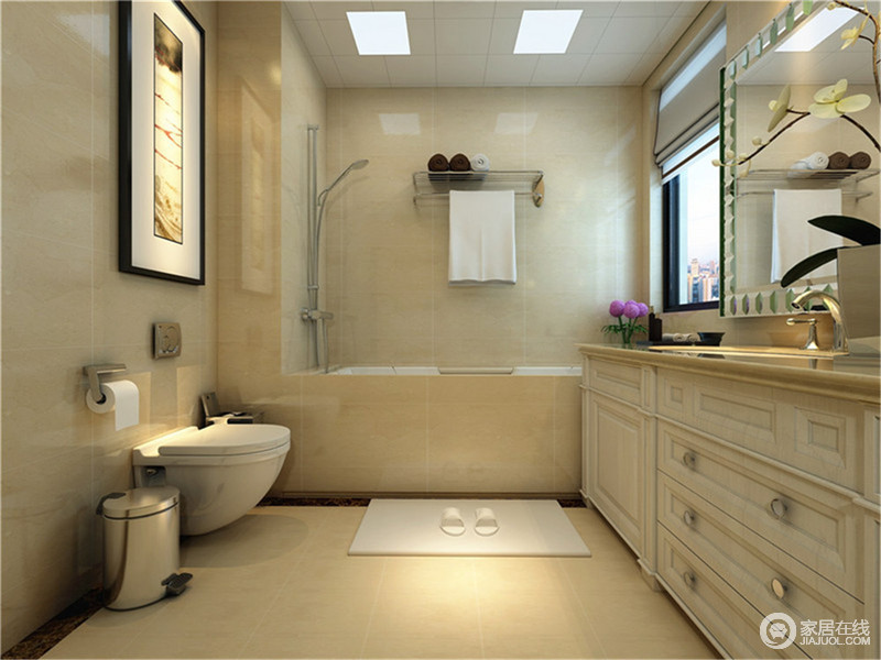 卫生间以浅黄色大理石铺陈出整个空间，斗柜式盥洗橱柜丰富了空间的储物功能，淋浴区与浴缸相结合且正对窗台，便于沐浴时观景。墙上的挂画内置灯管，透露着简约的雅致。
