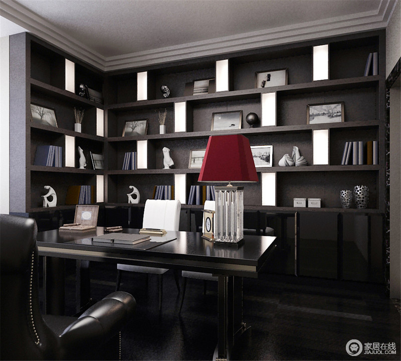 书房充满了书香味儿，设计师根据原始空间的的结构将黑褐色实木书柜嵌入其中，凑成一种几何立体感，书柜内陈设的艺术品带着文艺气息，让生活别有风姿；黑色书桌上的红色台灯巧妙激活了空间，与黑白组合的椅子让空间更显格调。