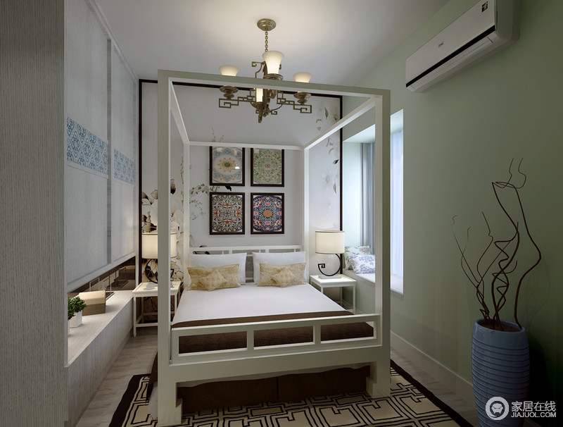 卧室使用了改良版的四柱床，虽然看上去占满了空间，但是却营造出一种极具安全感的睡眠环境。床头水墨花卉与印花挂画风格迥异，却在浅青绿墙面的烘托下，充满盎然意境。