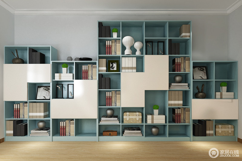 书房内的书柜完成了生活所需要的收纳，蓝白相间的书柜给予生活实用哲学，便捷实用。
