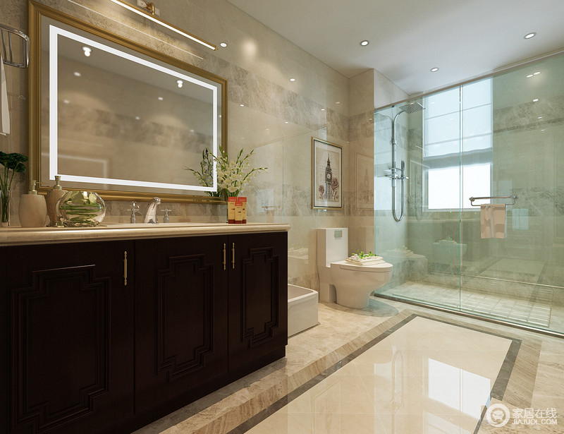 卫生间的功能区域比较疏离，强调了实用主义。浅灰色大理石与深色实木的搭配，带来空间的朴质情调。而浴室镜框与橱柜把手的金色使用，从细节体现空间的低调贵气。