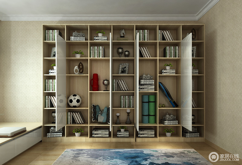 书房以定制书柜来解决藏书的需求，原本书柜搭配白色板材，让整个书柜更显实用，同时也为空间带来一种立体美学。