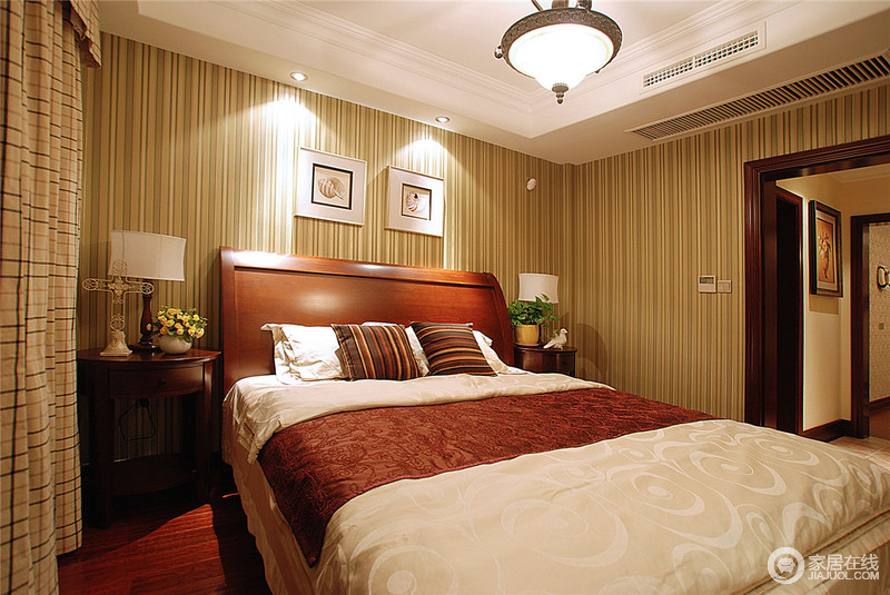 主卧室的布置和选材与整体风格相互辉映的感觉。