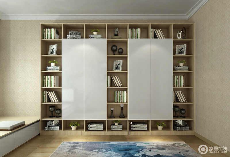 书房以米色壁纸来铺贴墙面，并搭配定制化的书柜，上演一种立体美学和实用哲学，让生活格外文艺。