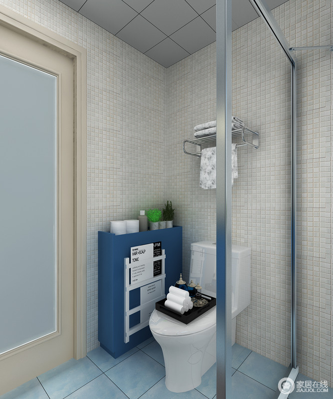 卫生间铺贴了浅灰色砖石，与蓝色地砖构成色彩对比，素静而干净，再加上淋浴区的设计，让干湿更为分明。
