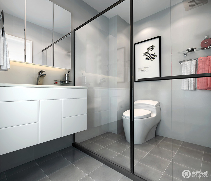 卫浴空间以灰色打底，低调内敛的营造出轻松的氛围环境。黑白的加入，调剂了空间的同时，多了份时尚感。通透的玻璃，使空间的干湿区得到有效隔离，便于空间的清爽整洁。