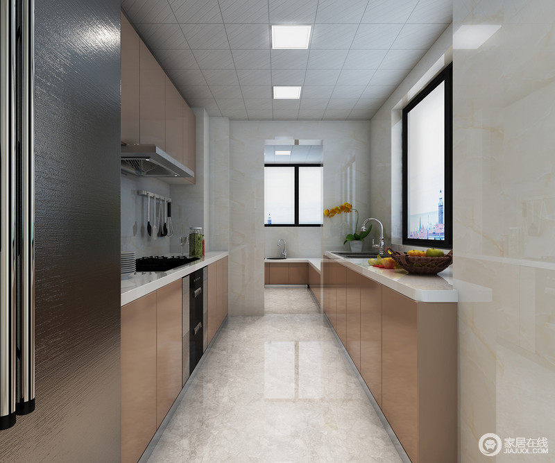 厨房灰白色地砖通透，打造着整洁的空间；驼色橱柜与白色台面显得干净；设计师将烹饪区与洗涤区分开，令空间匀称得体，设计感强烈。