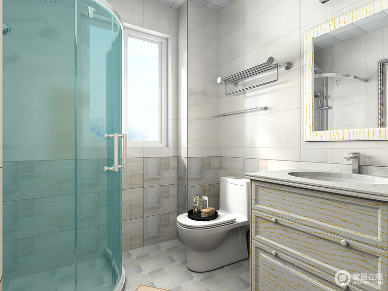 卫生间利用蓝色淋浴房将空间进行干湿分区，灰色砖石拼接式设计给予空间动律，素雅之中，更耐磨、易打理，盥洗柜的收纳功能强调了实用美学。
