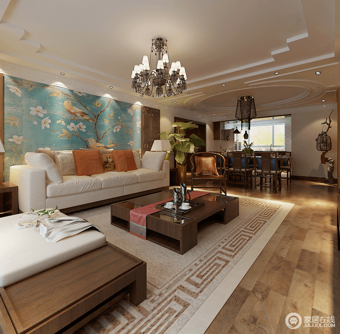 客厅中汲取了很多的中式元素，如回字边地毯、中国花鸟图、木质家具等，再结合现代感的设计，让空间清新中不乏中式底蕴。