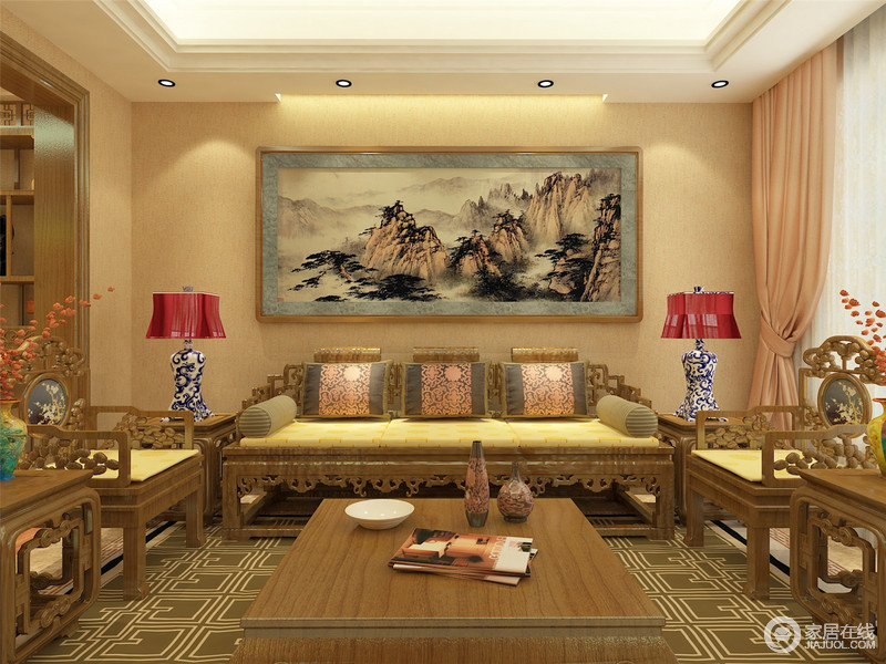 客厅的设计延续着传统中式艺术的方式，山水画的墨意生动和青花瓷红色台灯给中式空间带来色彩；纯实木沙发的中式厚重奠定了生活的文化气息，青绿色回字纹地毯更填妙趣。