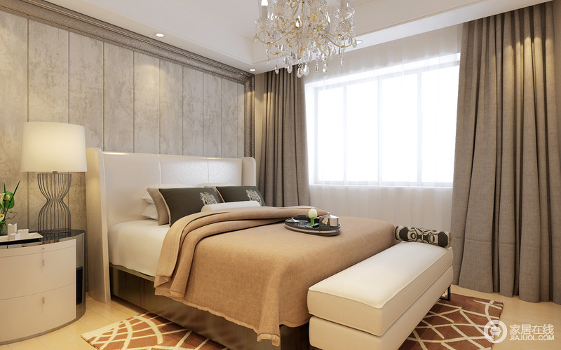 卧室延续了中性色的主调，以简洁的造型、完美的细节，营造出时尚前卫的感觉；驼色毛毯让空间倍加温馨。