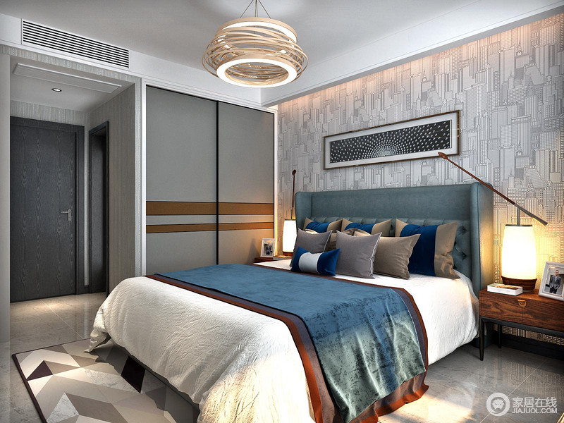 卧室以灰色几何壁纸铺贴墙面，与衣柜门的深灰色构成对比，蓝色床头和薄毯锦上添色，多了优雅；对称的设计，除了满足需要之外，也尤为人性，让你的夜读更为便捷。