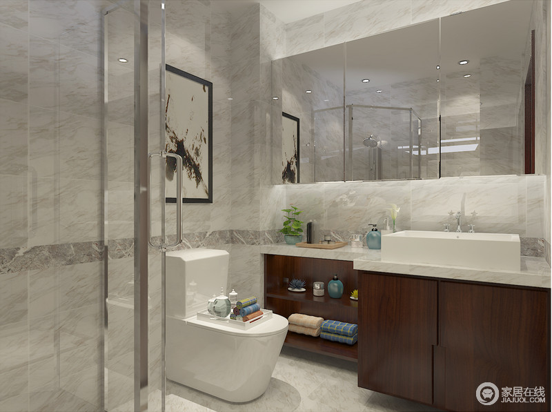 卫浴间主要通过石材和玻璃来打造，两者结合出天然质感的硬朗，不经雕琢就将艺术气质展现得与众不同，让人尊享沐浴之旅。