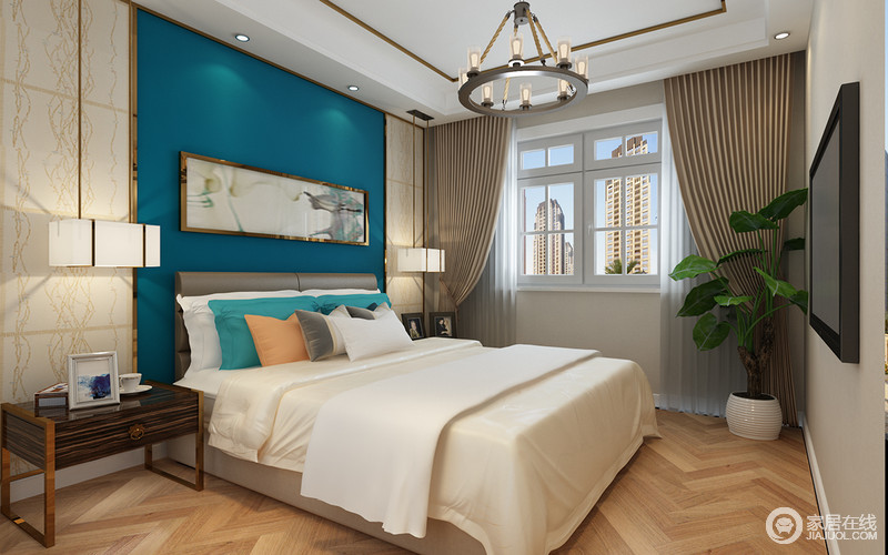 卧室虽然面积不大，却处处充满温馨与细腻；通过方体吊灯来化解挑高及摆放的繁琐，呈现了现代工业感；靛蓝色背景墙、抽象画作和白色的床品形成一股清流，令居室充满明快和高雅。