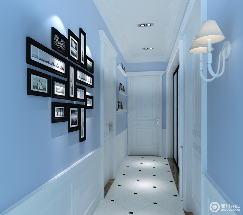 走廊的地面以白色为主，黑色点缀其间，形成一个好似繁星的效果，在大面积蓝色墙面的掩映下，表达着“星空”的概念，而照片墙不仅温情还令空间愈加文艺。