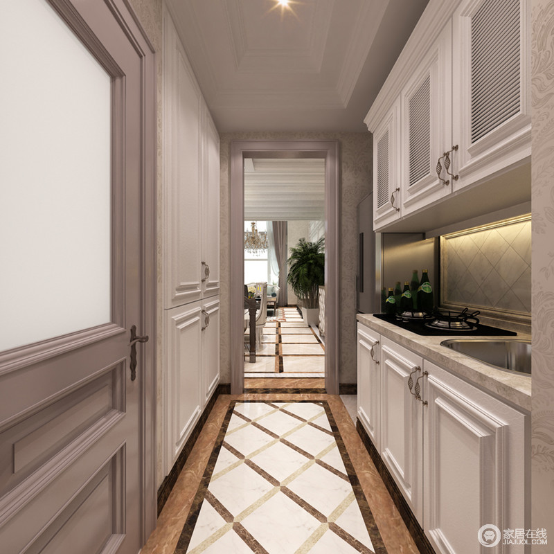 厨房采用了白色设计，嵌入式收纳利用墙面释放出空间来，使相对狭促的厨房显得非常的简单落落大方。双色拼花地板在白色的映衬下，显出丰富的肌理来。