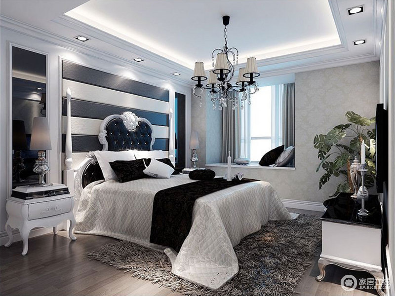 卧室延续整体黑白调，风格则更偏向现代简约气质。花瓣造型的雕花拉扣镶钻床头与家具突显空间的欧式格调，空间流露出简而脱俗的清丽优雅。