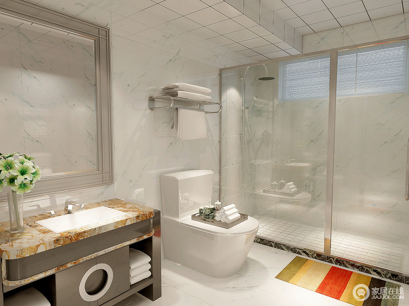 卫浴间通过玻璃将干湿分区，并且打造出一个独有的淋浴区，增强了私密性和实用性；高纯度白色砖石令空间愈显整洁，简单的设计更好的满足生活需求，还兼顾着空间与人文的和谐共融，凸显美观。