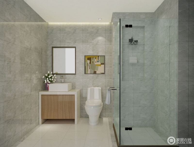 卫浴间设计得十分简单，爽静之间更显硬朗；灰色地砖铺贴出素色，玻璃淋浴房丝毫不受光线的影响，通透的质感与简易的收纳架更显实用，并与简约的盥洗柜呼应出现代感。