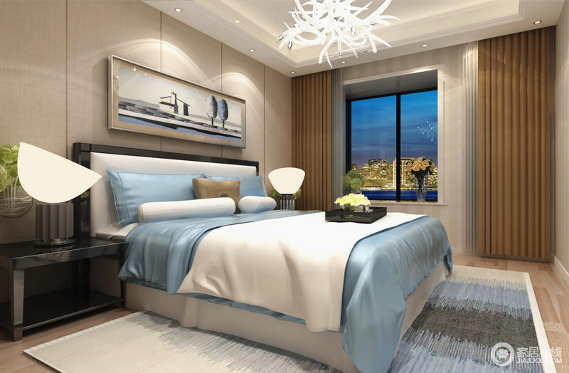 淡雅的蓝色床单与咖色窗帘、木质地板上晕染的蓝白灰地毯、床头的风景装饰画使空间透露着一种宁静之美。