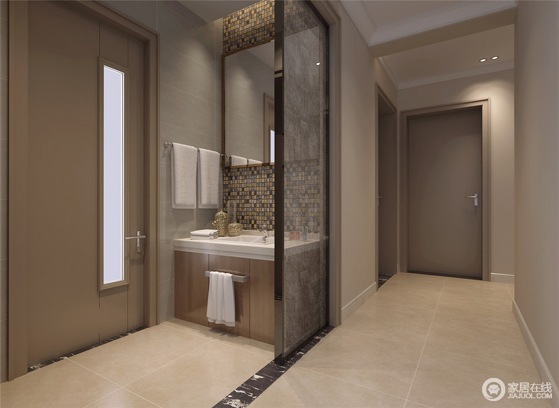 考虑到空间使用，设计师将盥洗台外置，方便日常盥洗与卫浴空间的独立使用。低调的灰与褐色间，加入丰富视觉的马赛克砖，通过通透玻璃的隔断，使一隅空间也显得精致细腻。