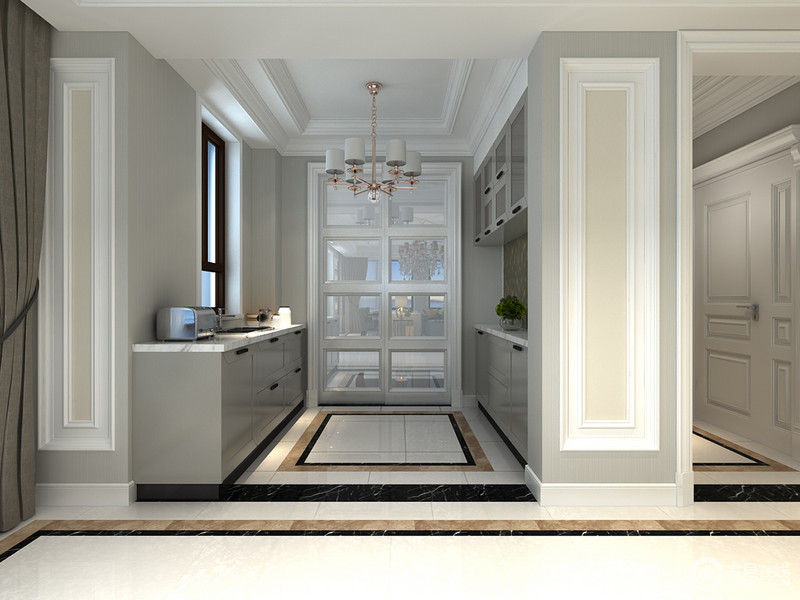 厨房的位置刚好位于入户门厅区域，设计师以对称式造型设计，以低调内敛中性的灰色，与白色相交搭配，规整中展现出简洁硬朗的空间气质，并很好的减弱了厨房的烟火之气。