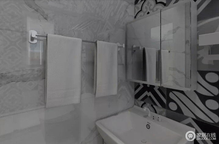 卫生间空间很小，因此大面积用了浅色砖，并采用了小尺寸的洗手柜来增添便利性；淋浴玻璃隔断门解决了干湿分离，毛巾架也是起到了收纳的作用，让生活更为利落。