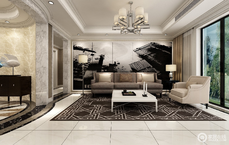 客厅在灰黑白空间中，加入了深咖和米色，彰显出沉稳的调性；大面积抢眼的沙发墙，将大都市的深邃感，释放融入到空间中。
