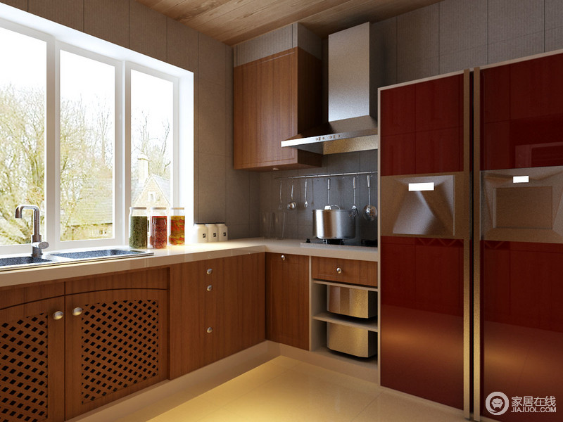 木质的温润使厨房展现出沉静的内敛柔和感，家电选用与壁橱同一色调，优雅的融合在橱柜之间。灰色质感墙面，在原木色的搭配下，显得沉稳俊朗。