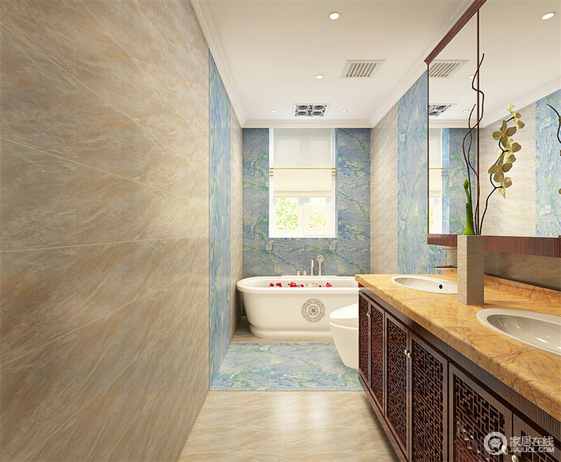 卫生间采用双色拼接，蓝色花纹的局部点缀，带着一股青花瓷式的雅格。镂空纹饰盥洗台橱柜，与之形成厚重与轻盈对比，营造空间的独特气质。